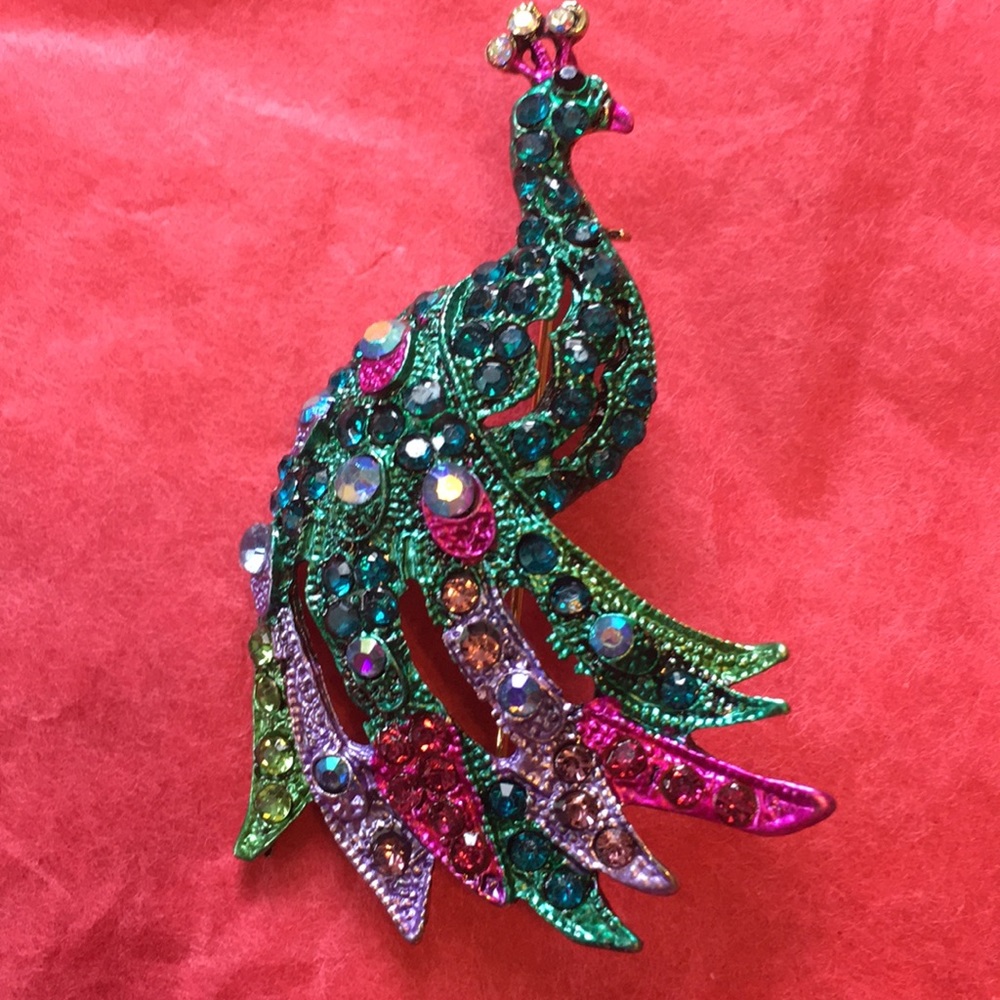 Beautifully jeweled peacock brooch
